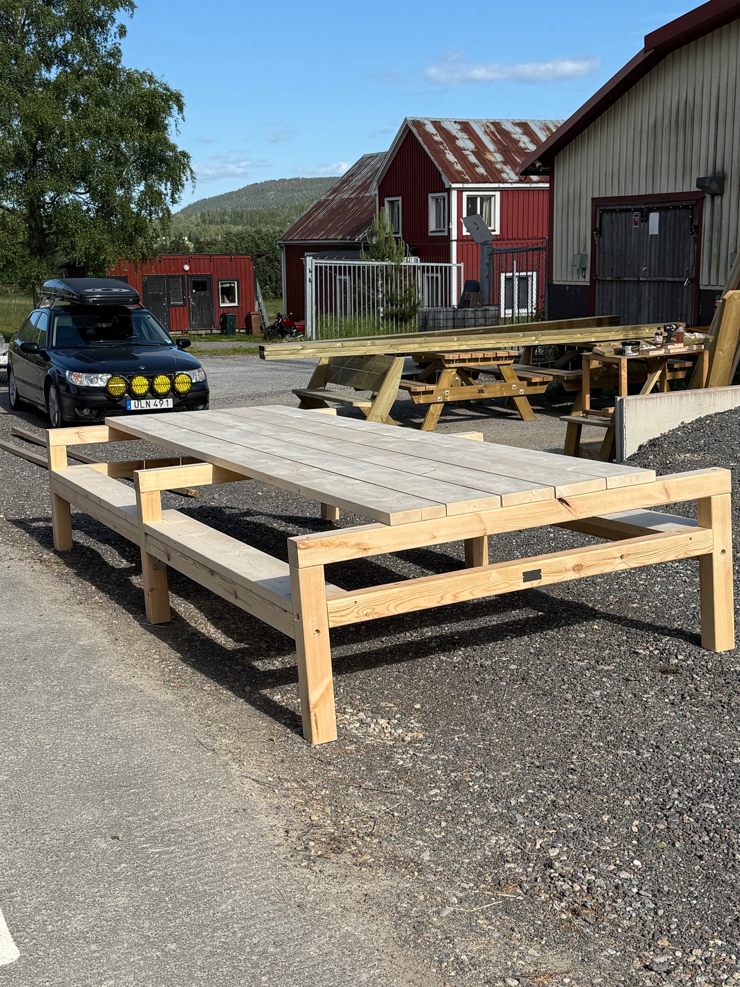 Långbord i pergolastil